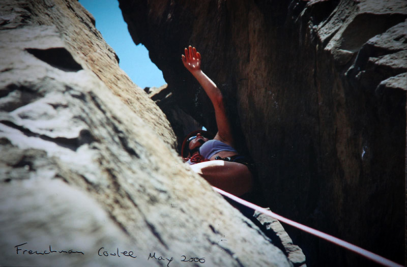 Climber between rocks.